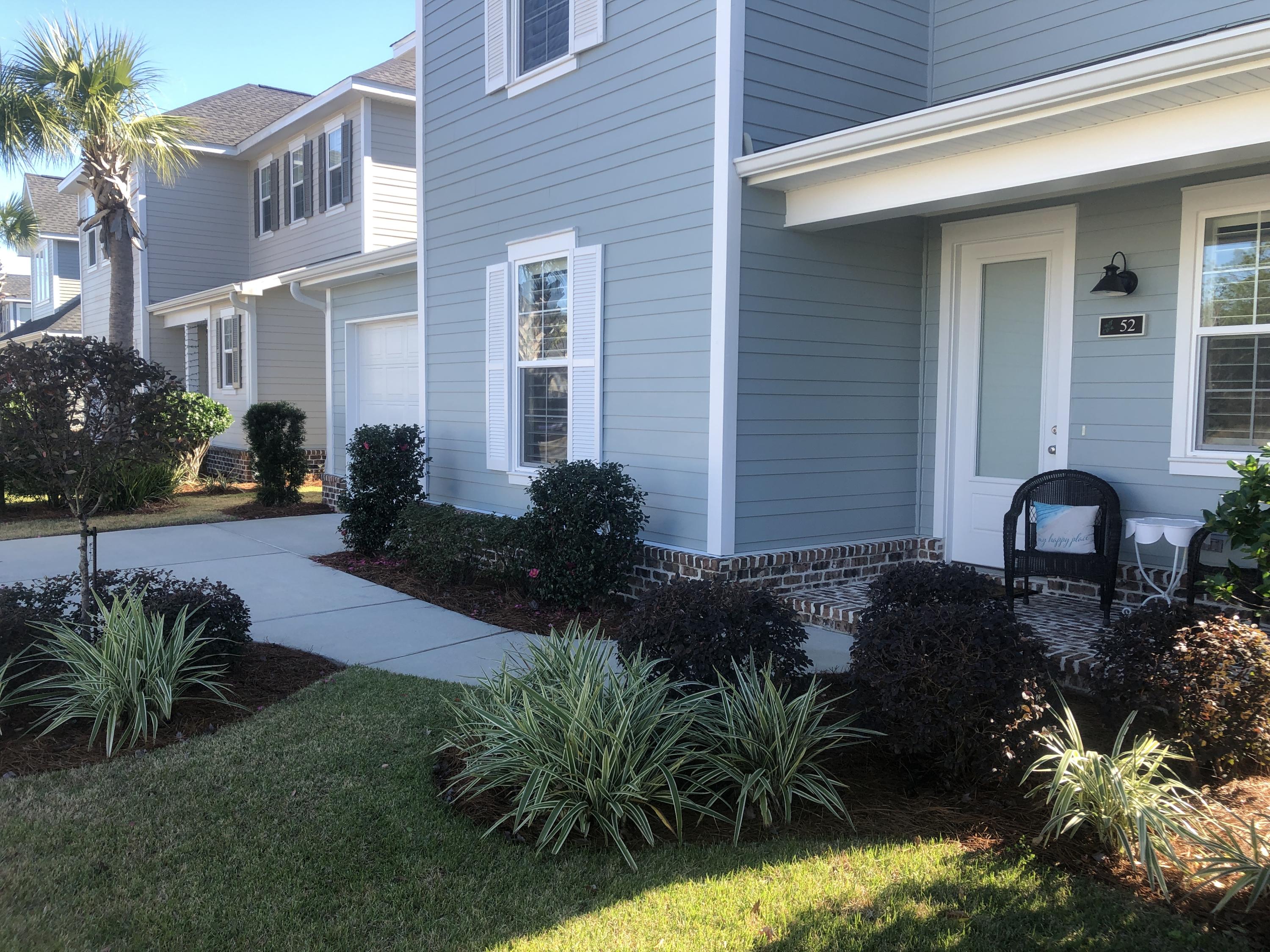 52 Chapman Street Santa Rosa Beach, FL 32459 - Photo 2 of 50 a front view of house and yard with seating space