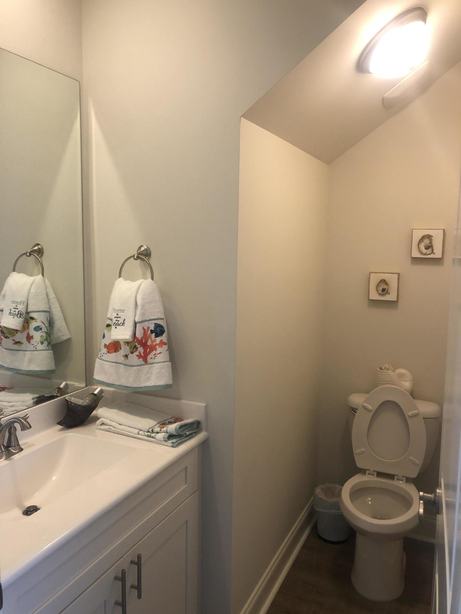 52 Chapman Street Santa Rosa Beach, FL 32459 - Photo 22 of 50 a bathroom with a sink and a toilet