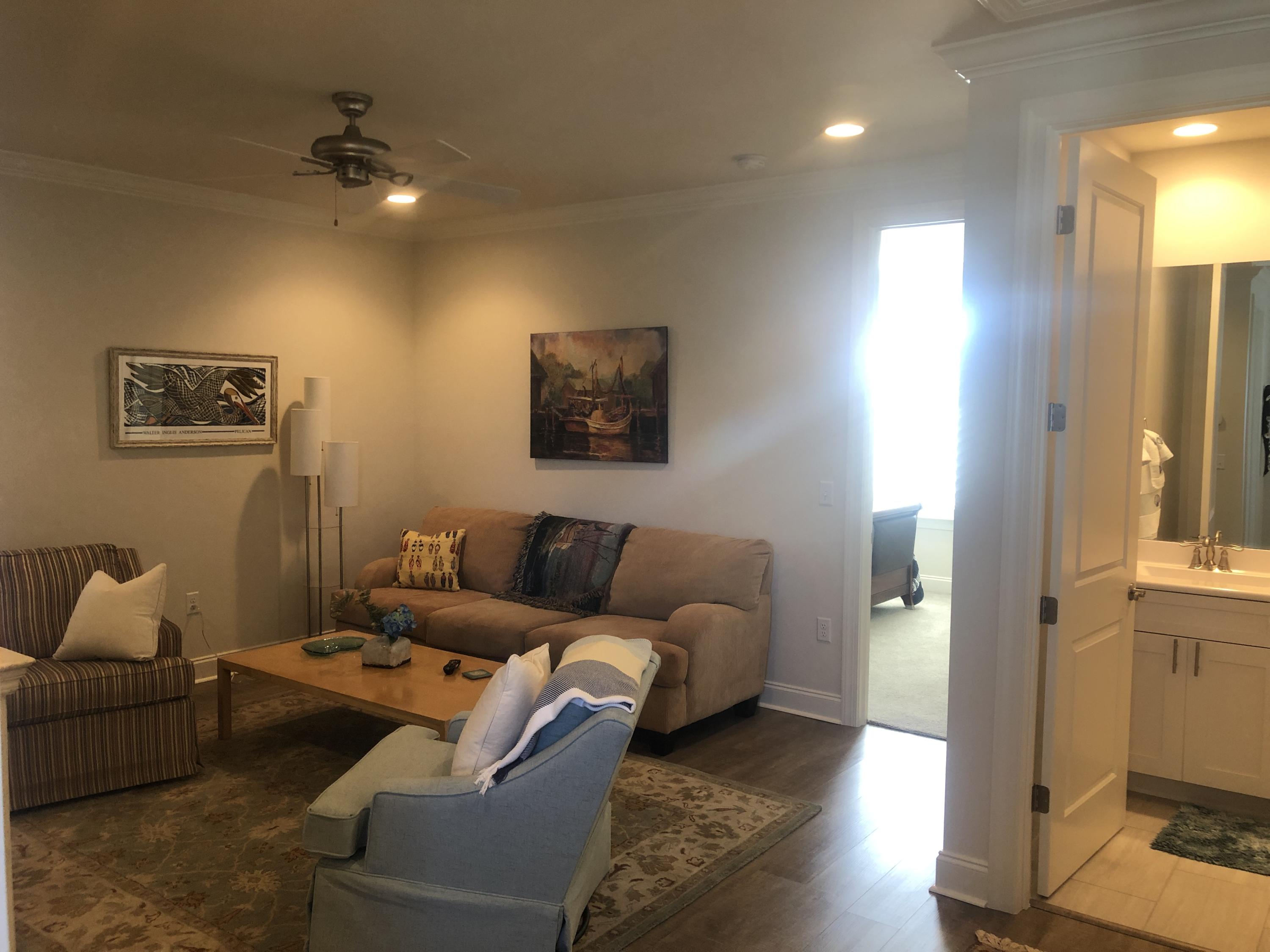 52 Chapman Street Santa Rosa Beach, FL 32459 - Photo 24 of 50 a living room with furniture and a lamp