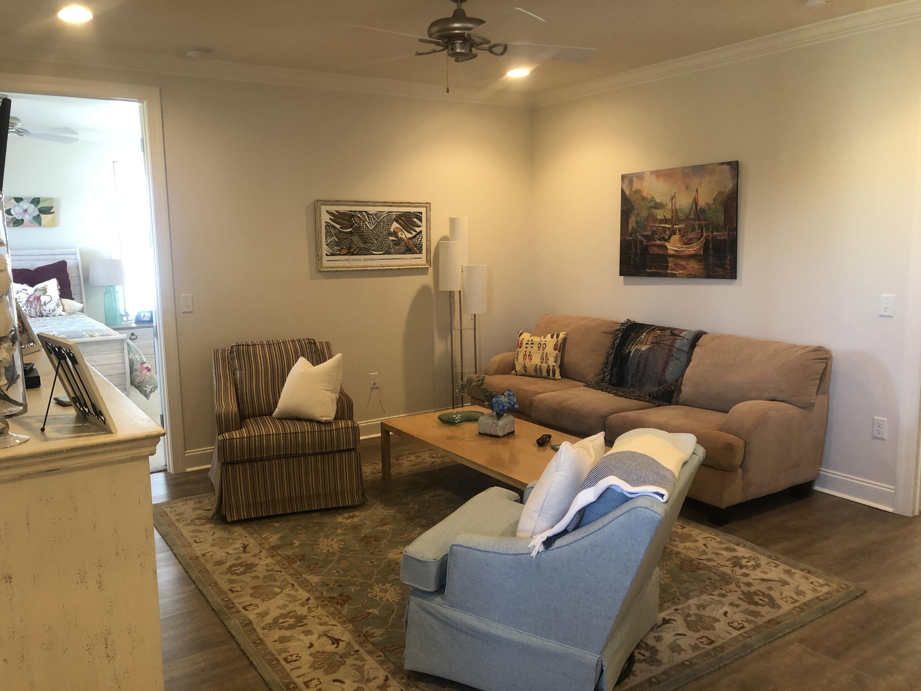 52 Chapman Street Santa Rosa Beach, FL 32459 - Photo 25 of 50 a living room with furniture and a couch