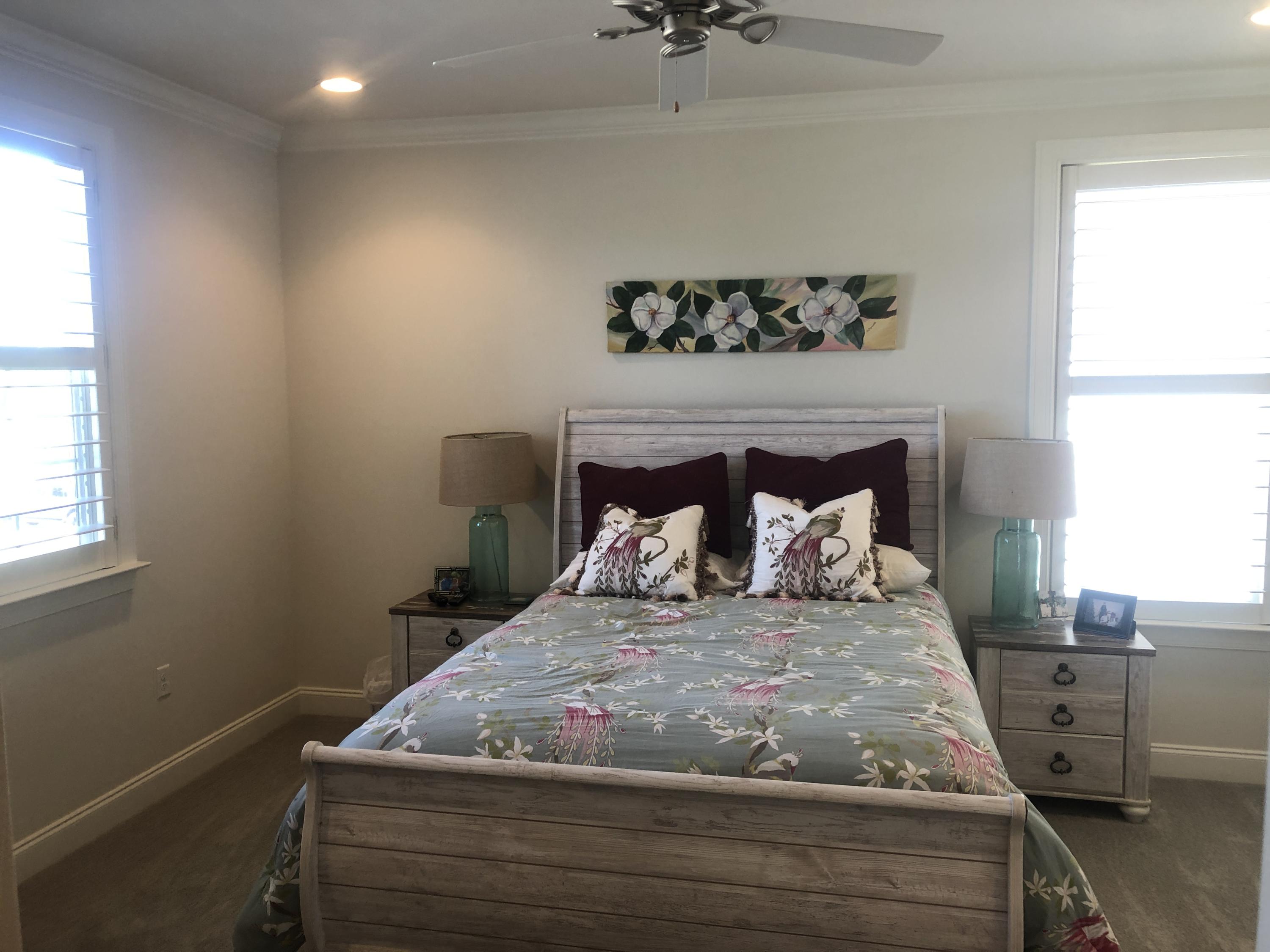 52 Chapman Street Santa Rosa Beach, FL 32459 - Photo 32 of 50 a bedroom with a bed and a window