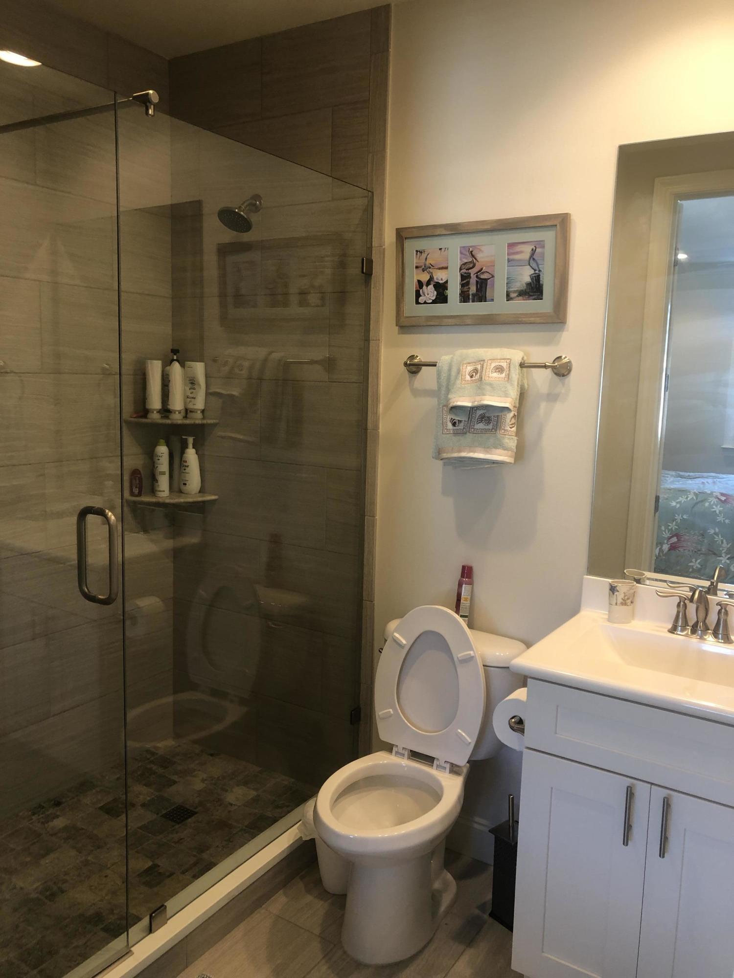 52 Chapman Street Santa Rosa Beach, FL 32459 - Photo 34 of 50 a bathroom with a sink toilet and shower