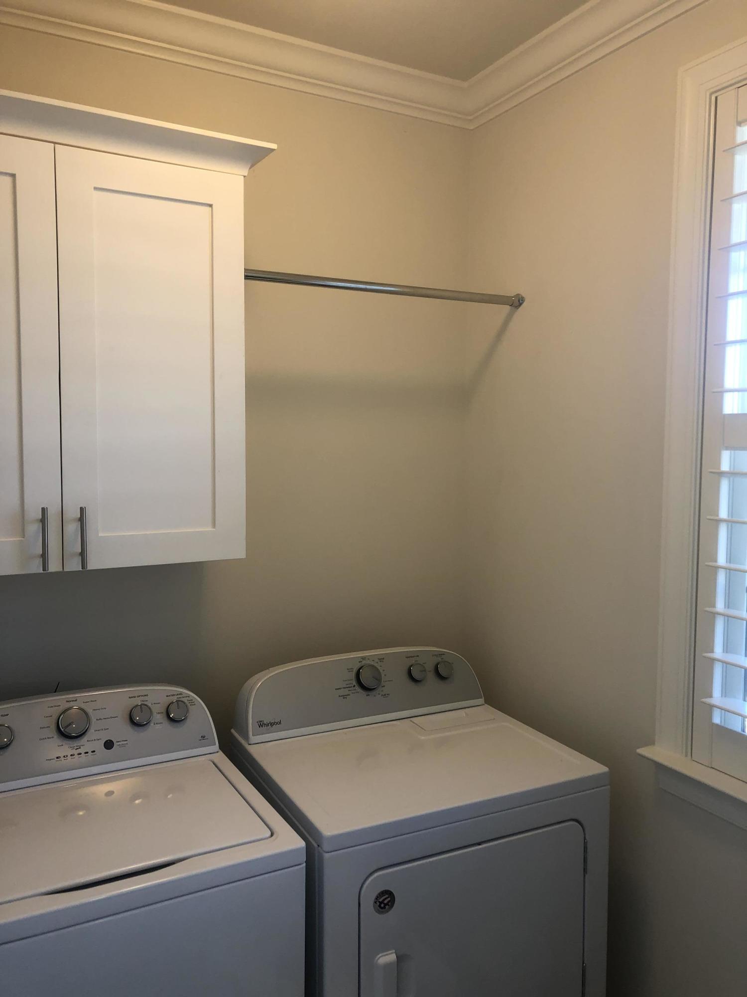 52 Chapman Street Santa Rosa Beach, FL 32459 - Photo 36 of 50 a utility room with dryer and washer