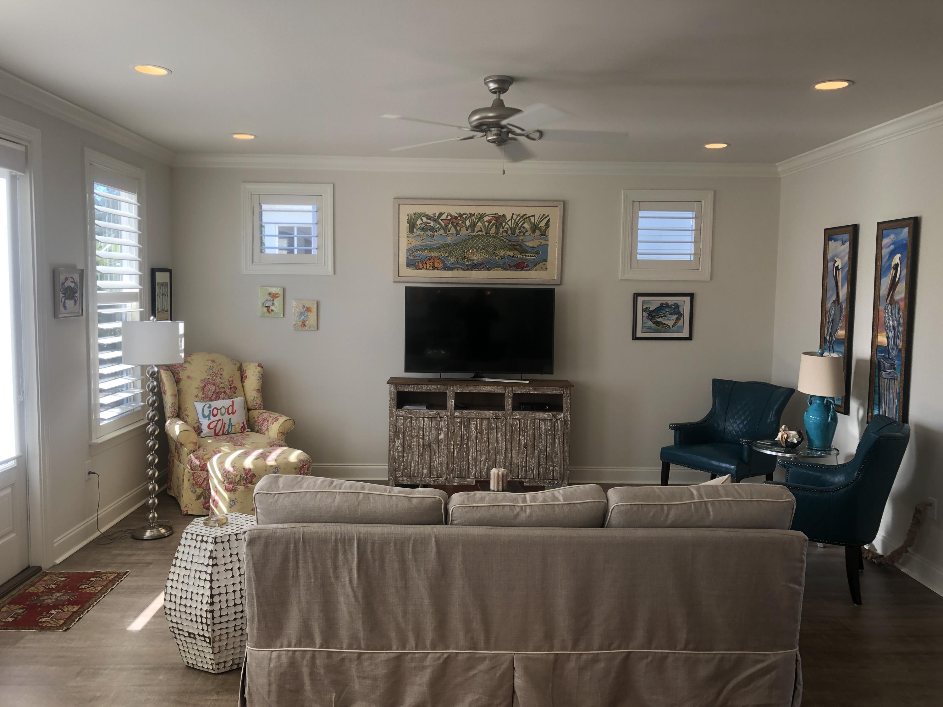 52 Chapman Street Santa Rosa Beach, FL 32459 - Photo 10 of 50 a living room with furniture and a flat screen tv