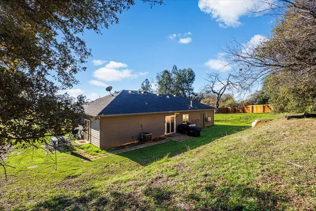 a view of a backyard with a garden