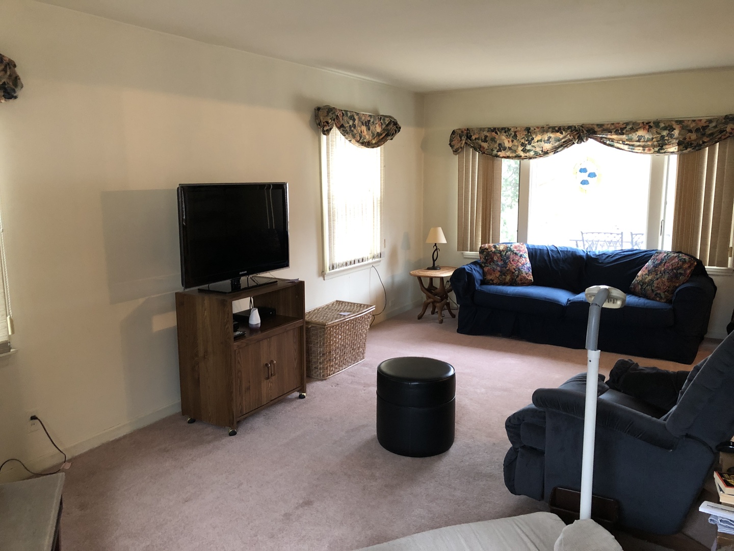 611 Normal Road DeKalb, IL 60115 - Photo 3 of 18 a living room with furniture and a flat screen tv