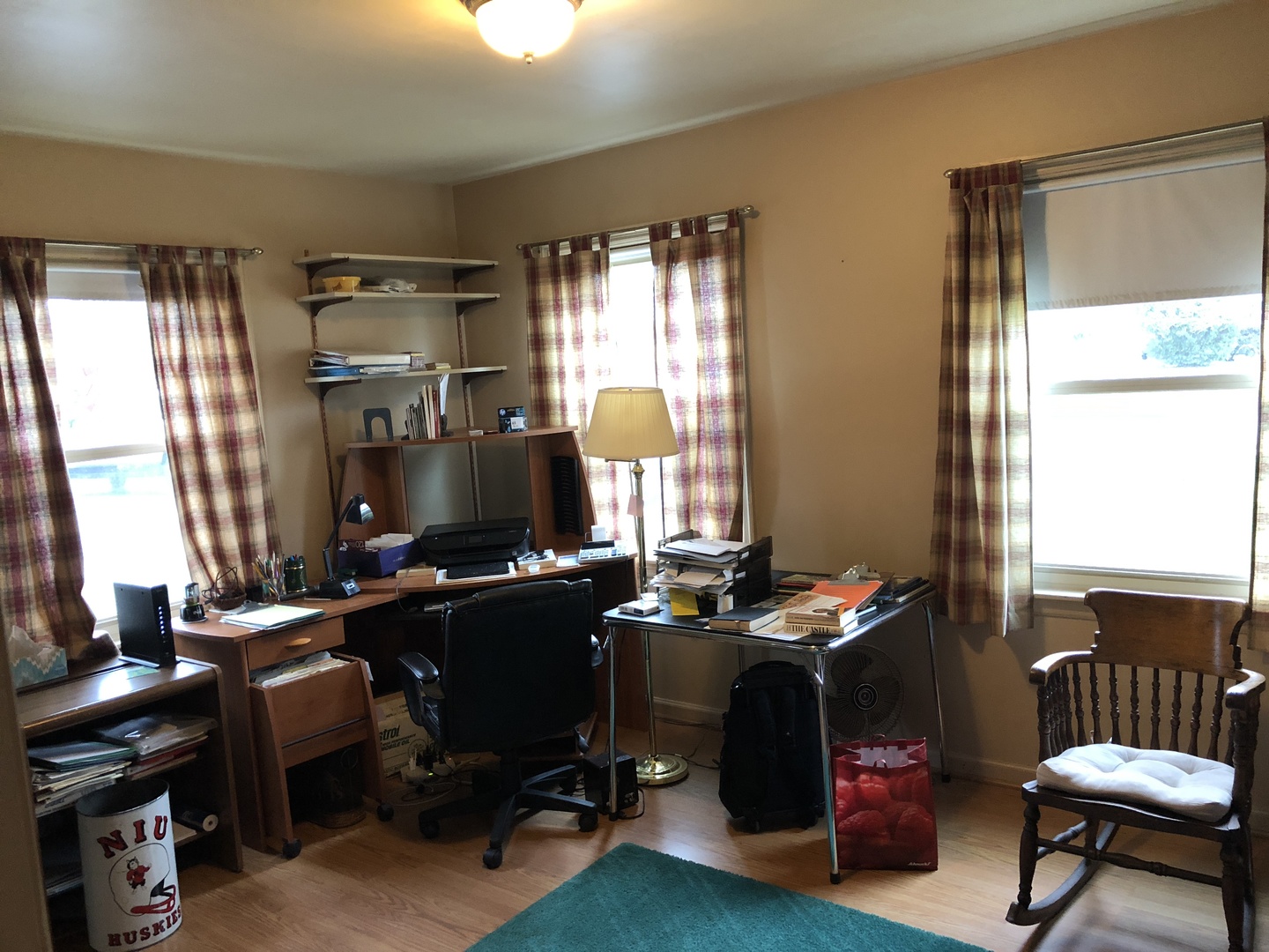 611 Normal Road DeKalb, IL 60115 - Photo 8 of 18 a view of a workspace with furniture and a window