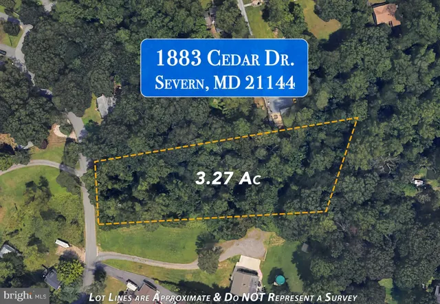 a sign that is sitting on a brick wall