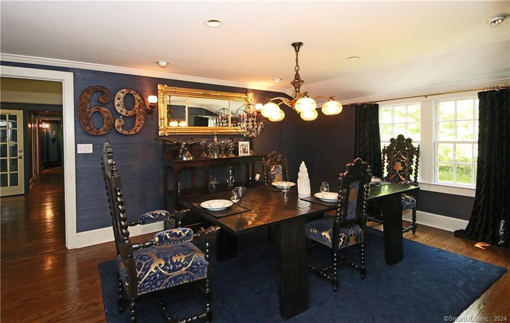 22 Ketcham Road Ridgefield, CT 06877 - Photo 30 of 40 a view of a dining room with furniture and wooden floor