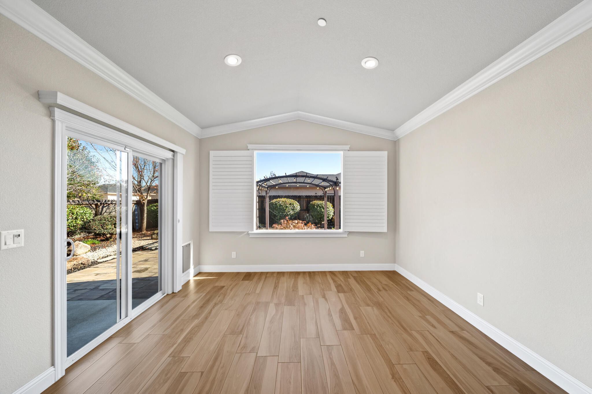 3375 Karuk Avenue Redding, CA 96002 - Photo 13 of 41 wooden floor in an empty room with a window