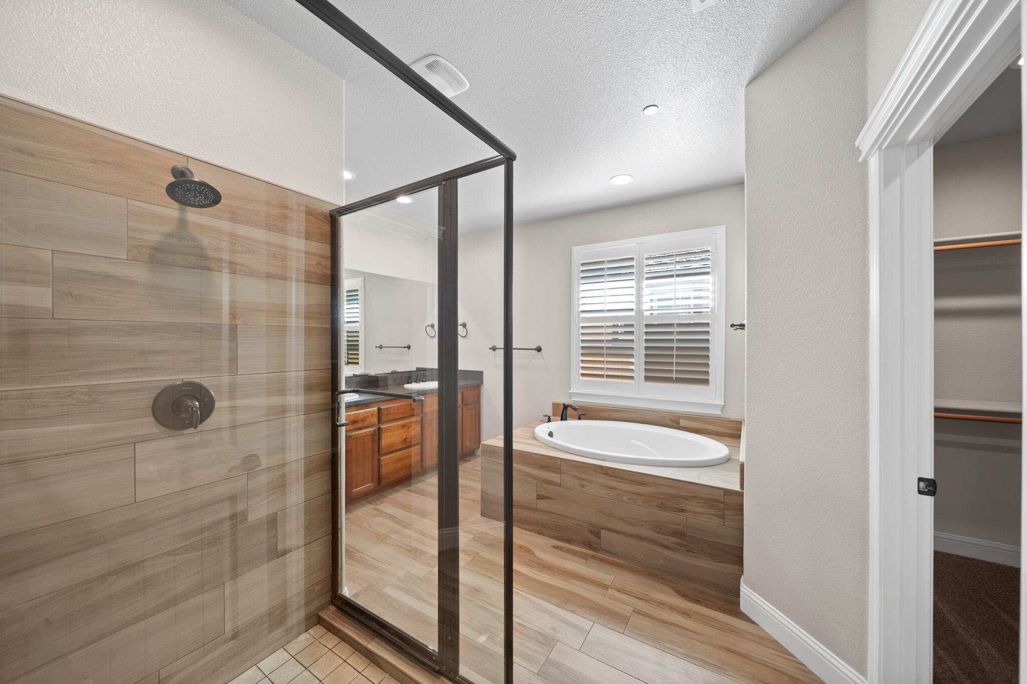 3375 Karuk Avenue Redding, CA 96002 - Photo 18 of 41 a bathroom with a tub shower and sink
