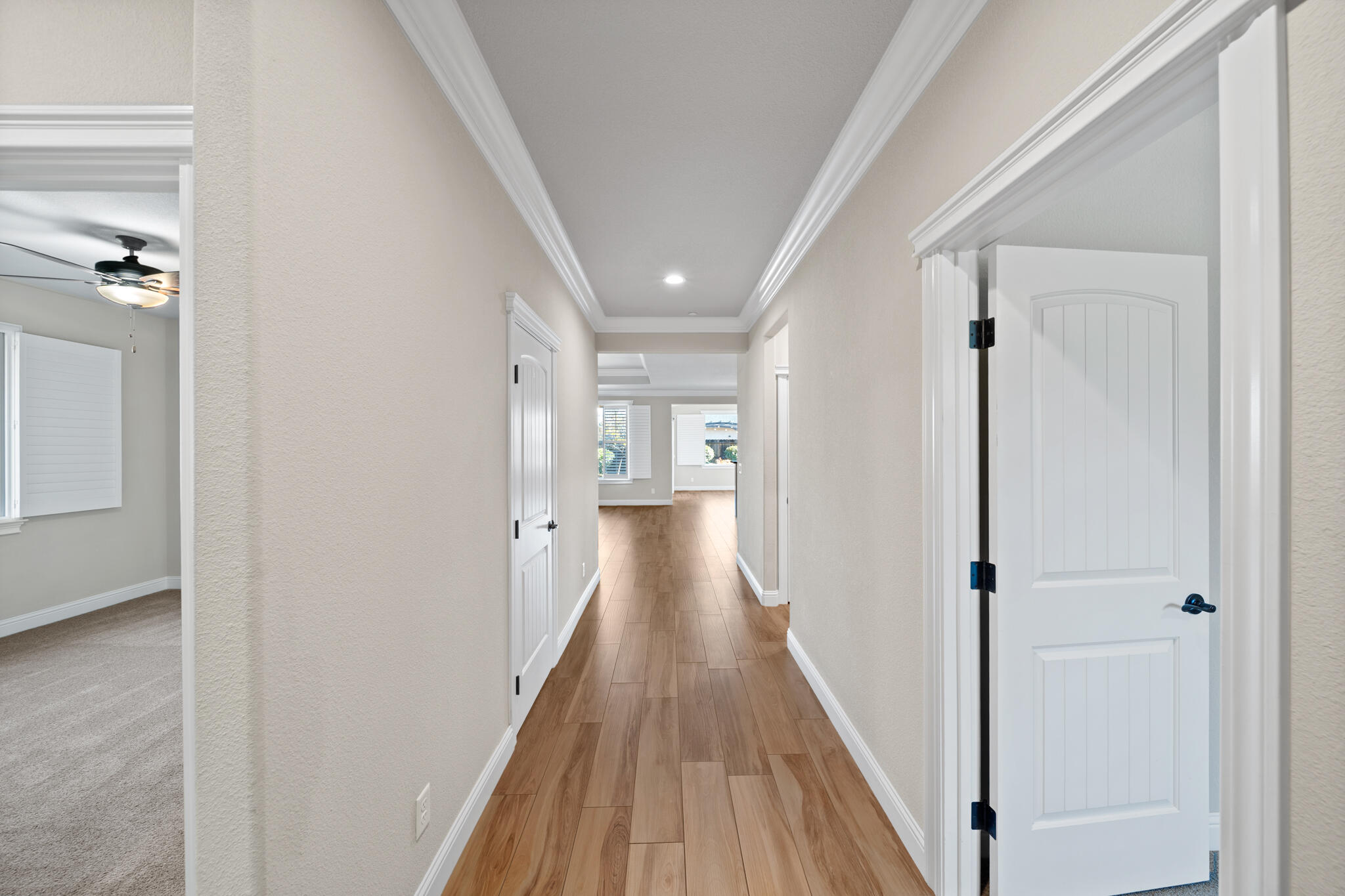 3375 Karuk Avenue Redding, CA 96002 - Photo 23 of 41 a view of a hallway with wooden floor and staircase