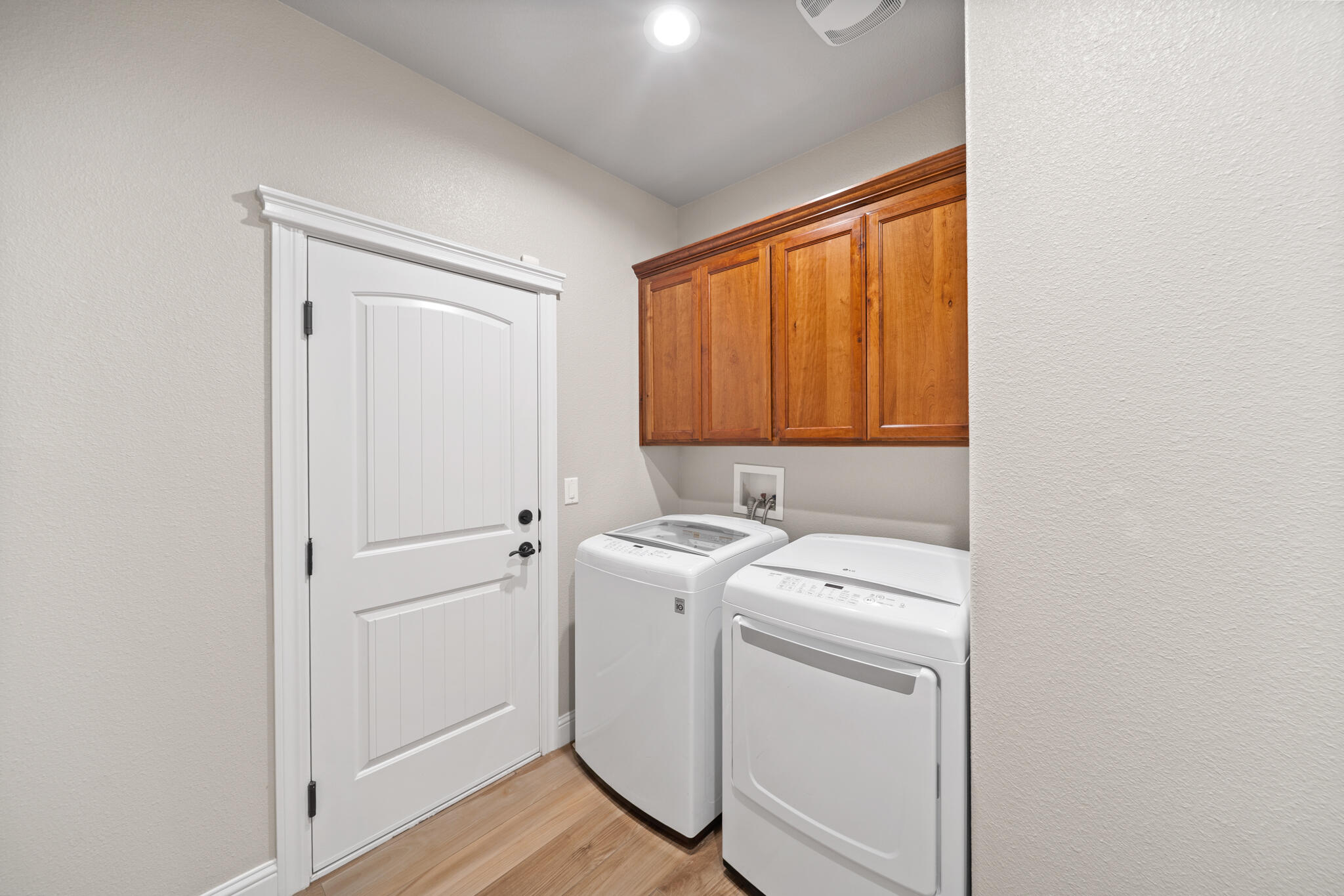 3375 Karuk Avenue Redding, CA 96002 - Photo 30 of 41 a view of a storage and utility room with washer and dryer