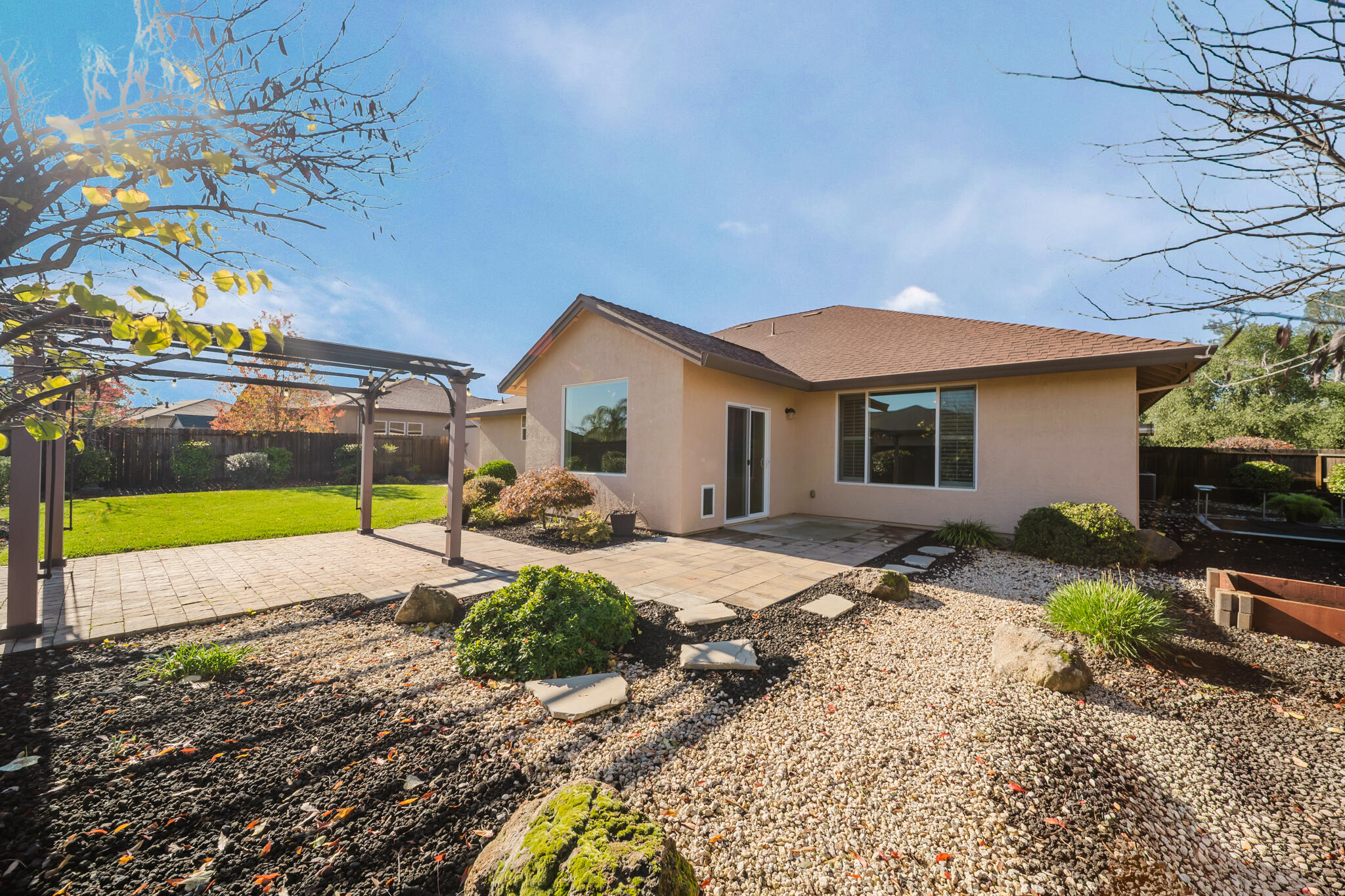 3375 Karuk Avenue Redding, CA 96002 - Photo 33 of 41 a view of a house with backyard and sitting area