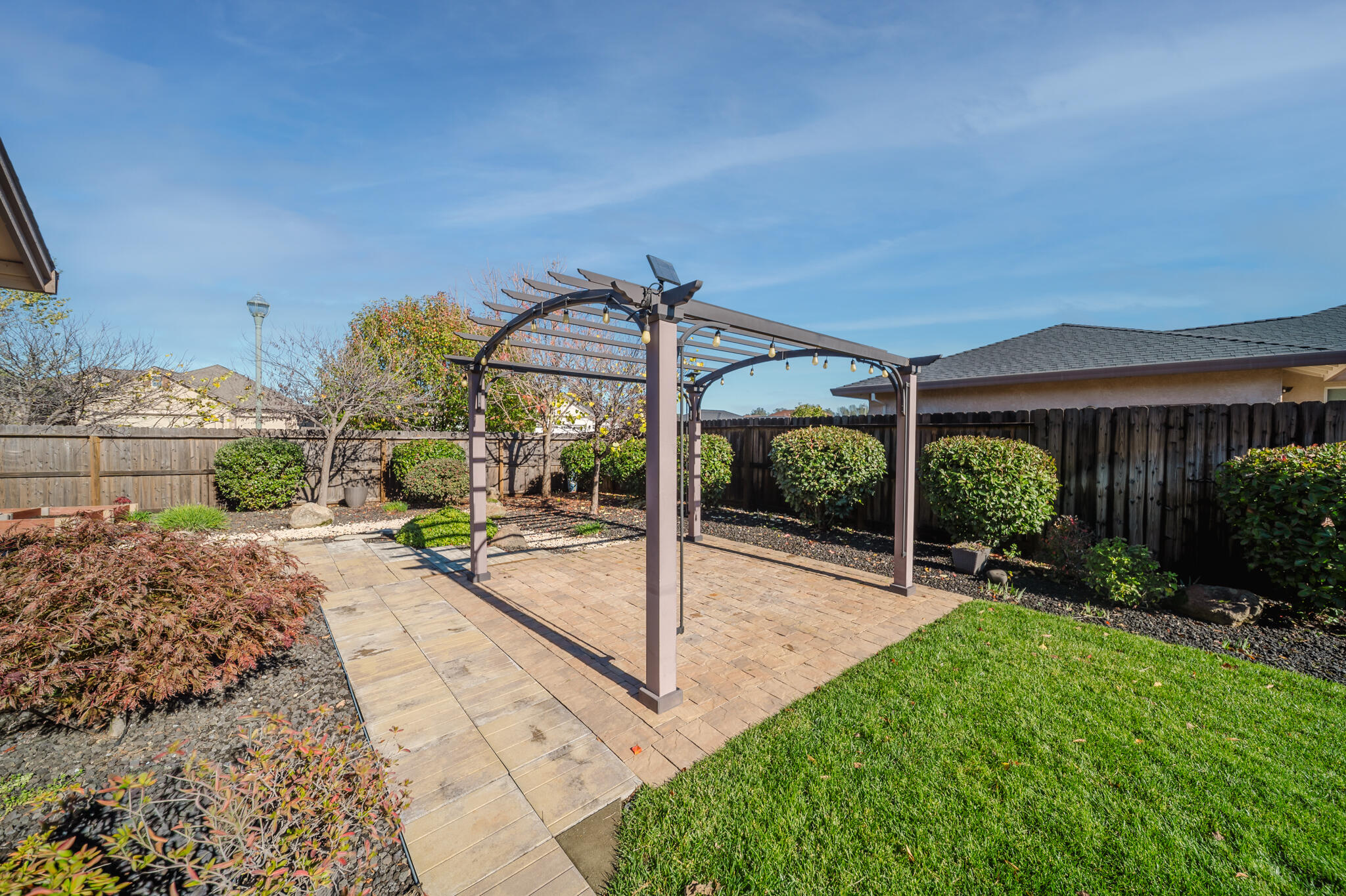 3375 Karuk Avenue Redding, CA 96002 - Photo 34 of 41 a view of a backyard with porch