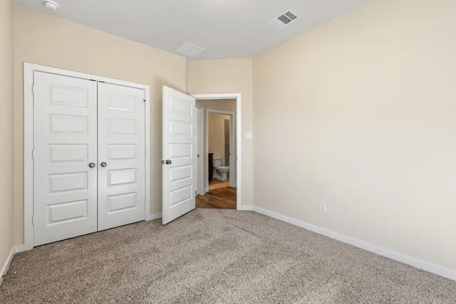 an empty room with closet