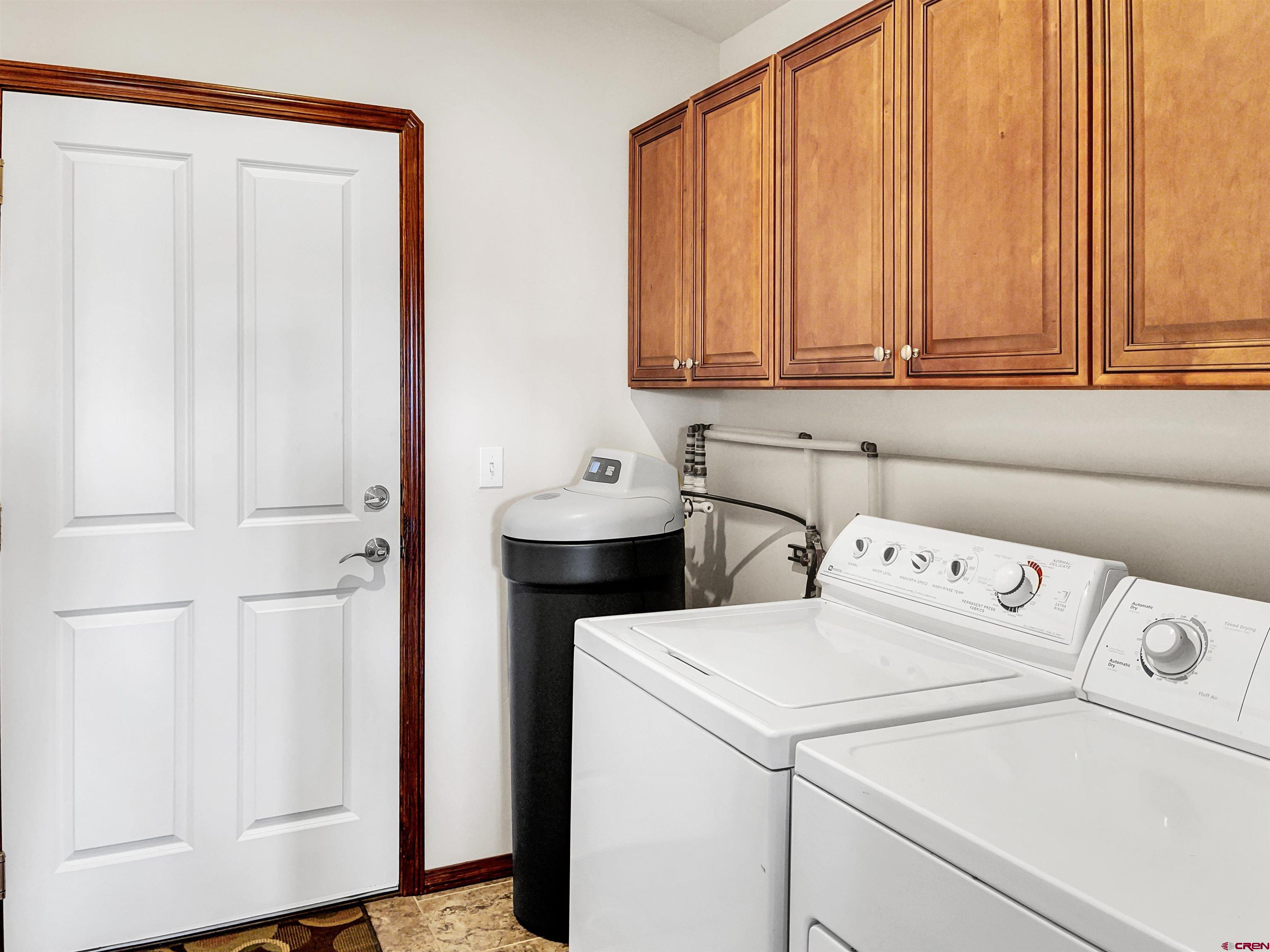 12336 Road 23.25 Loop Cortez, CO 81321 - Photo 26 of 34 a utility room with dryer and washer