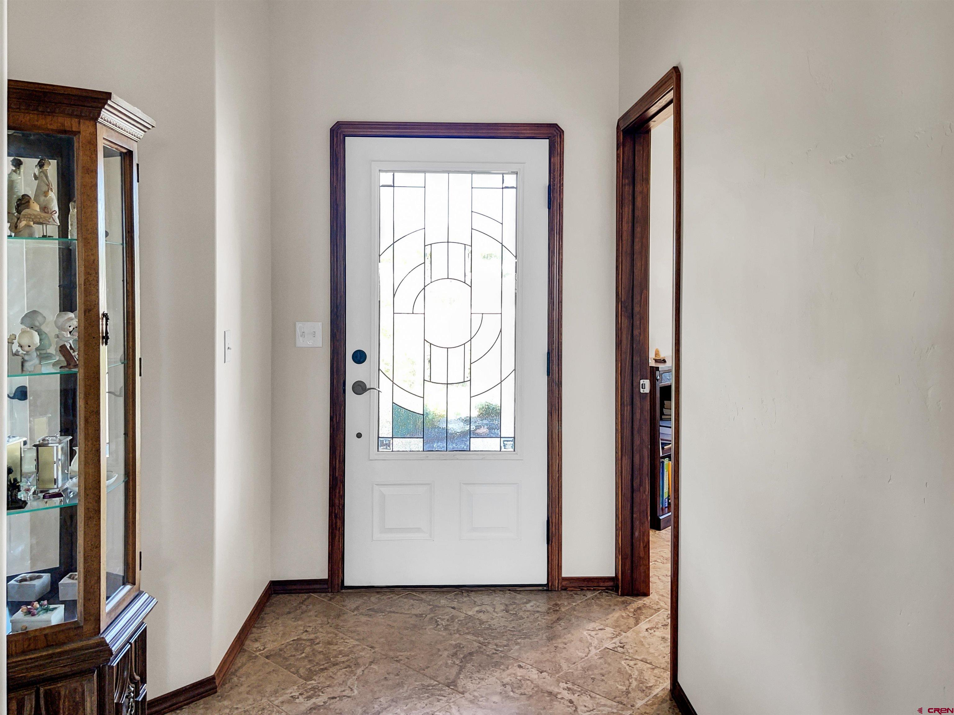 12336 Road 23.25 Loop Cortez, CO 81321 - Photo 4 of 34 a view of front door