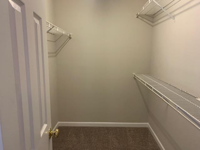8320 Hobhouse Circle Raleigh, NC 27615 - Photo 14 of 16 a view of small space with racks on the wall