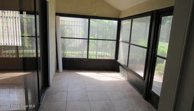 a swimming pool with outdoor seating and yard