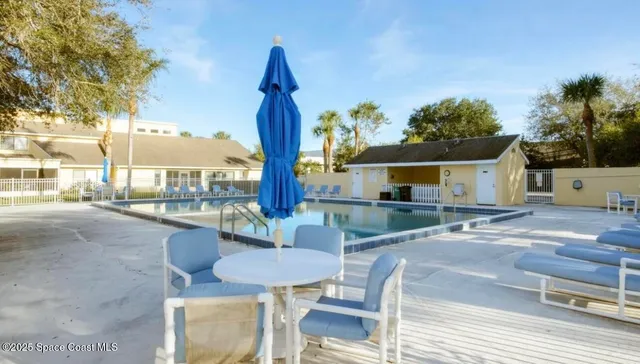 a view of yard with patio