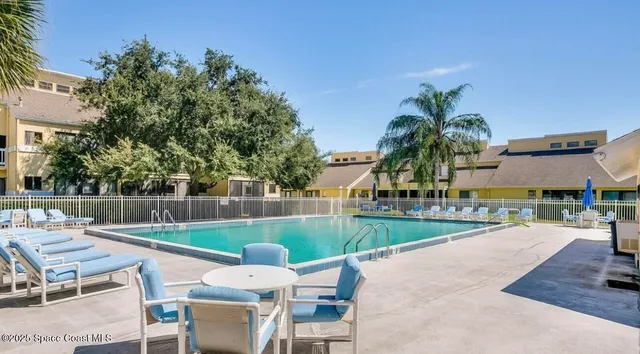 a view of a house with swimming pool