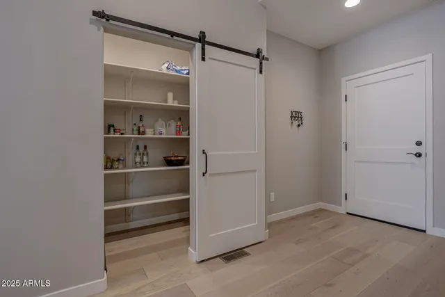 a view of an empty walk in closet