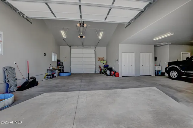 a view of a garage with furniture and a window