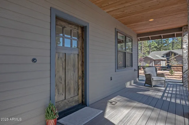 a view of livingroom with furniture and floor to ceiling window