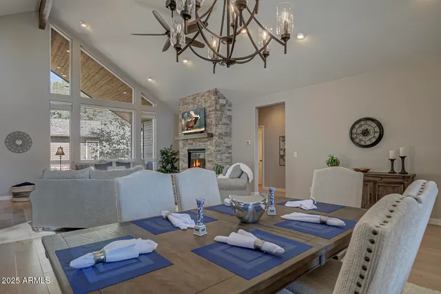 a living room with furniture a rug and a window