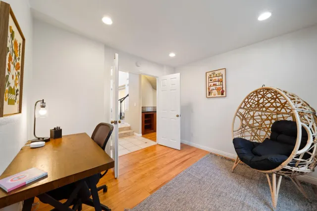 a room with furniture and a rug