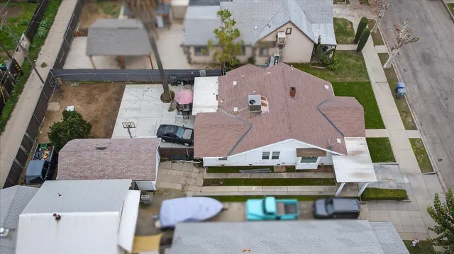 a black and white photo of a refrigerator