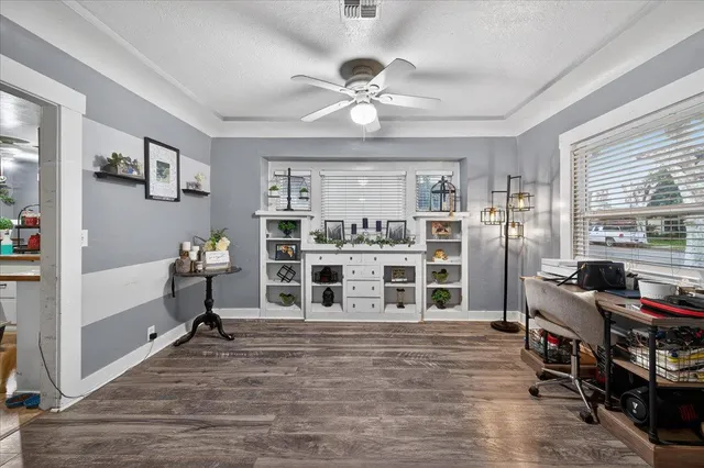 a living room with furniture and decor