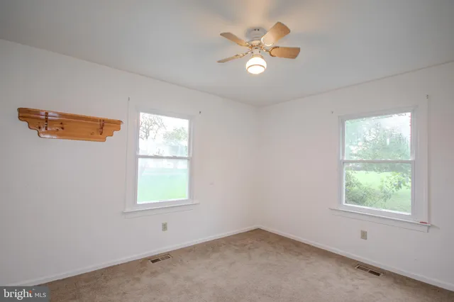 an empty room with window