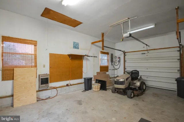 a view of a livingroom with furniture and windows
