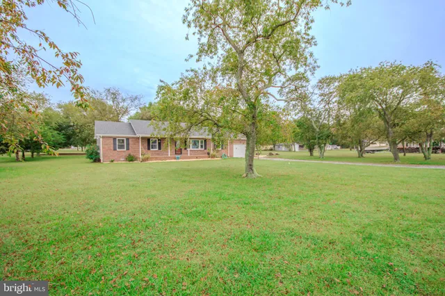 a view of a house with a big yard