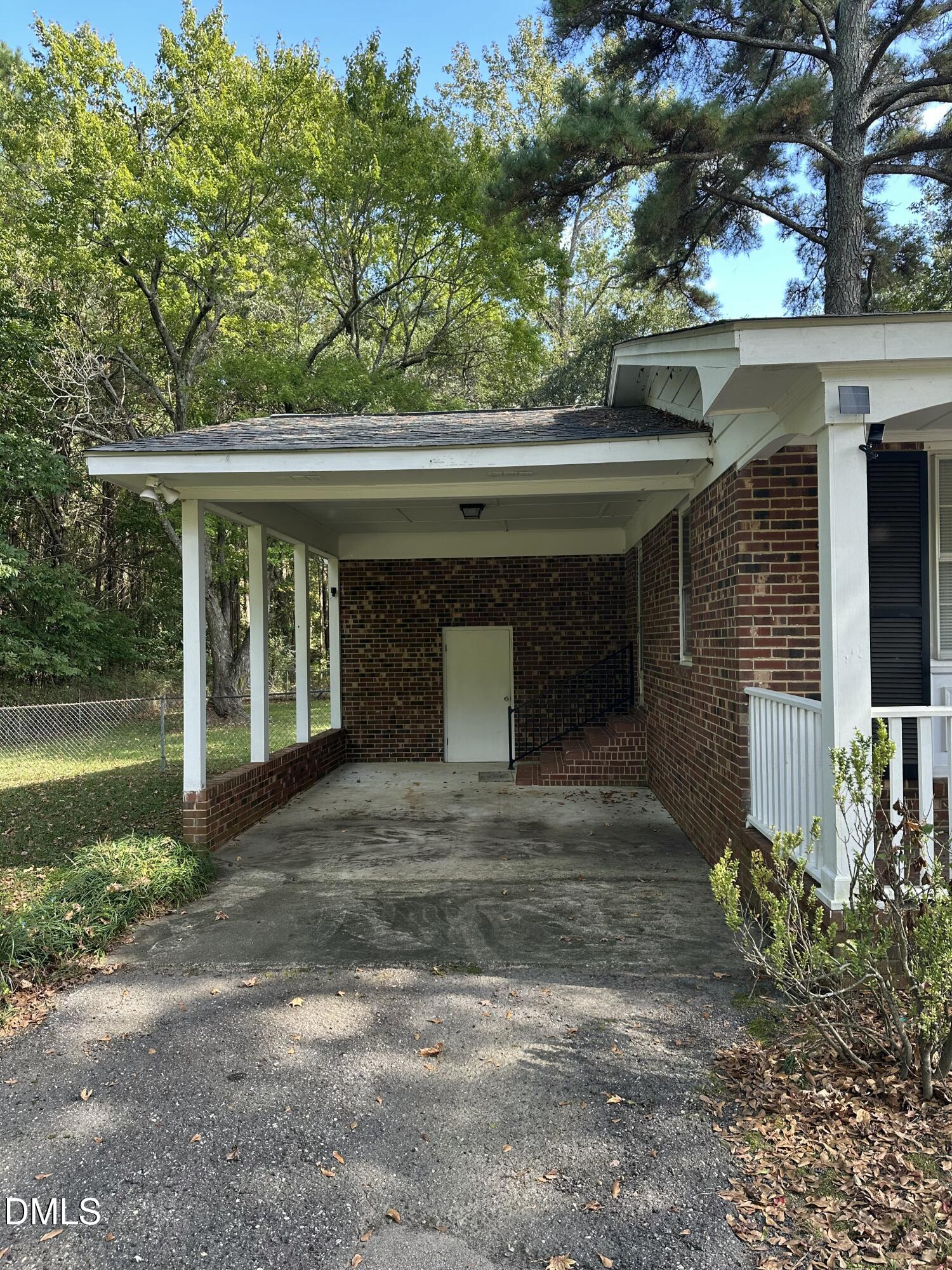 2516 Morphus Bridge Road Zebulon, NC 27597 - Photo 2 of 20 a front view of a house with garden