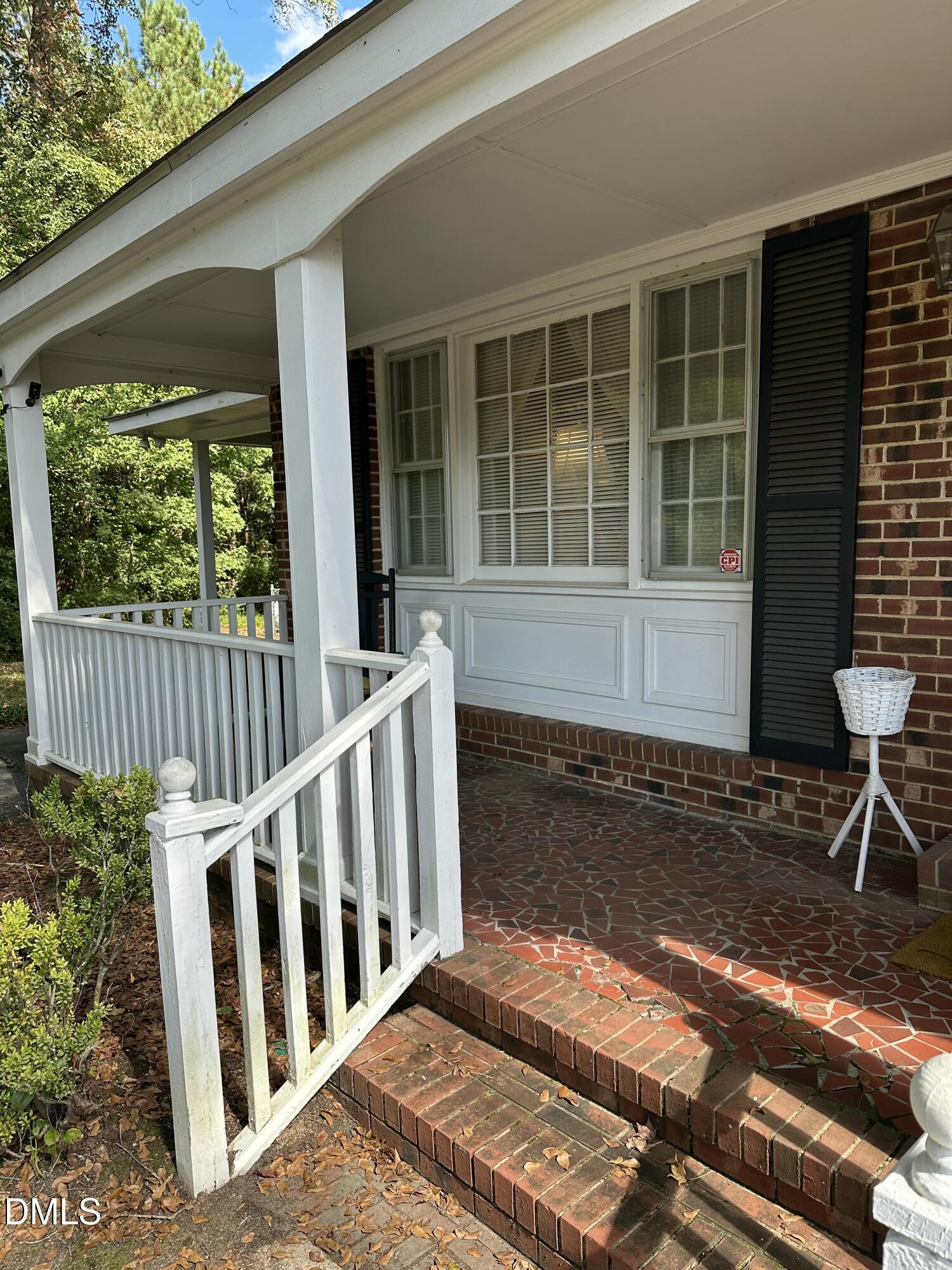 2516 Morphus Bridge Road Zebulon, NC 27597 - Photo 3 of 20 a view of a house with backyard and sitting area