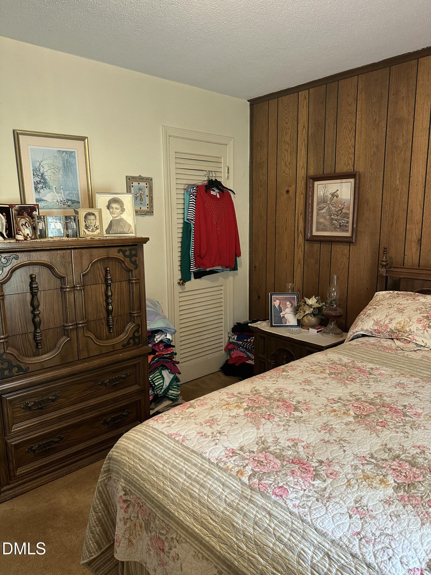 2516 Morphus Bridge Road Zebulon, NC 27597 - Photo 9 of 20 a bedroom with a bed and a closet