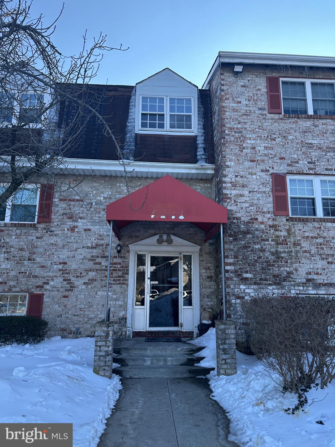11908 Tarragon Road, Unit G Reisterstown, MD 21136 - Photo 1 of 45 a front view of a house with parking area