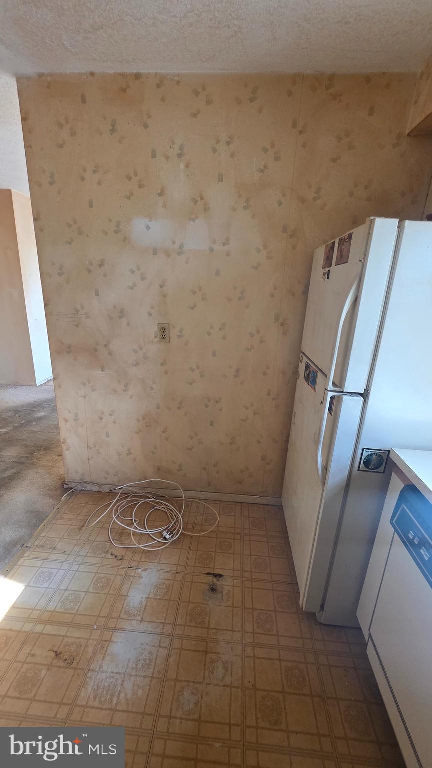 11908 Tarragon Road, Unit G Reisterstown, MD 21136 - Photo 18 of 45 a view of a utility room with empty racks