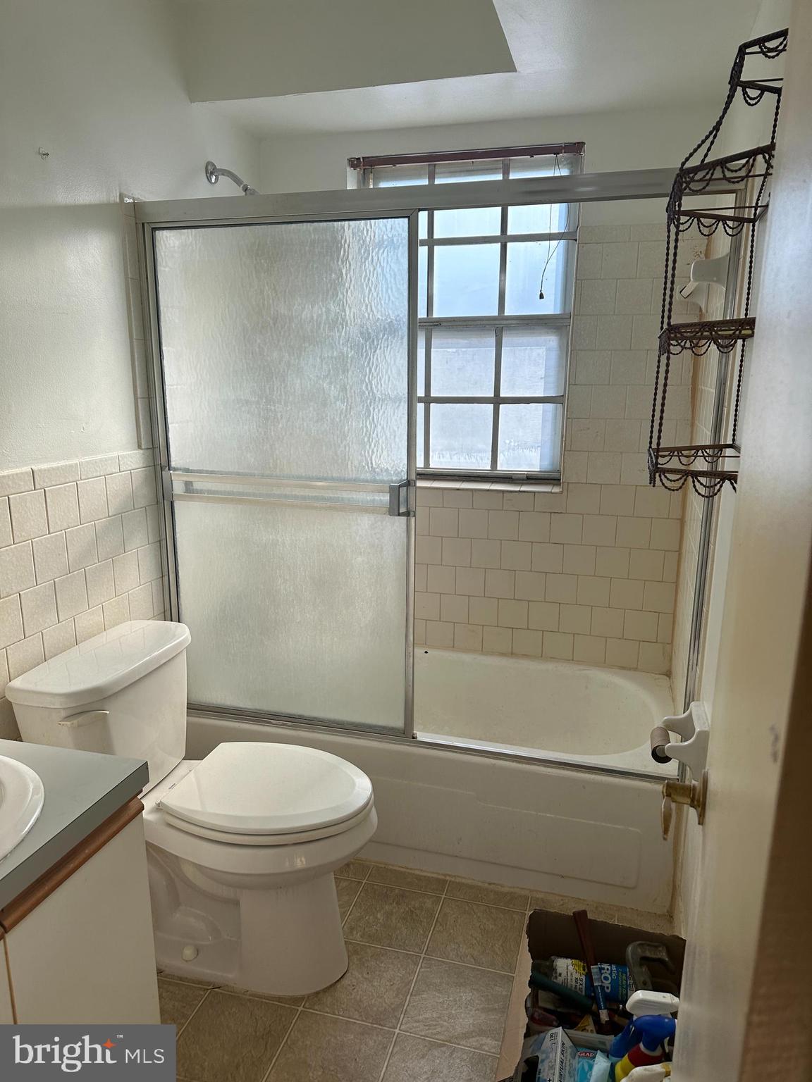 11908 Tarragon Road, Unit G Reisterstown, MD 21136 - Photo 22 of 45 a bathroom with a toilet and a shower