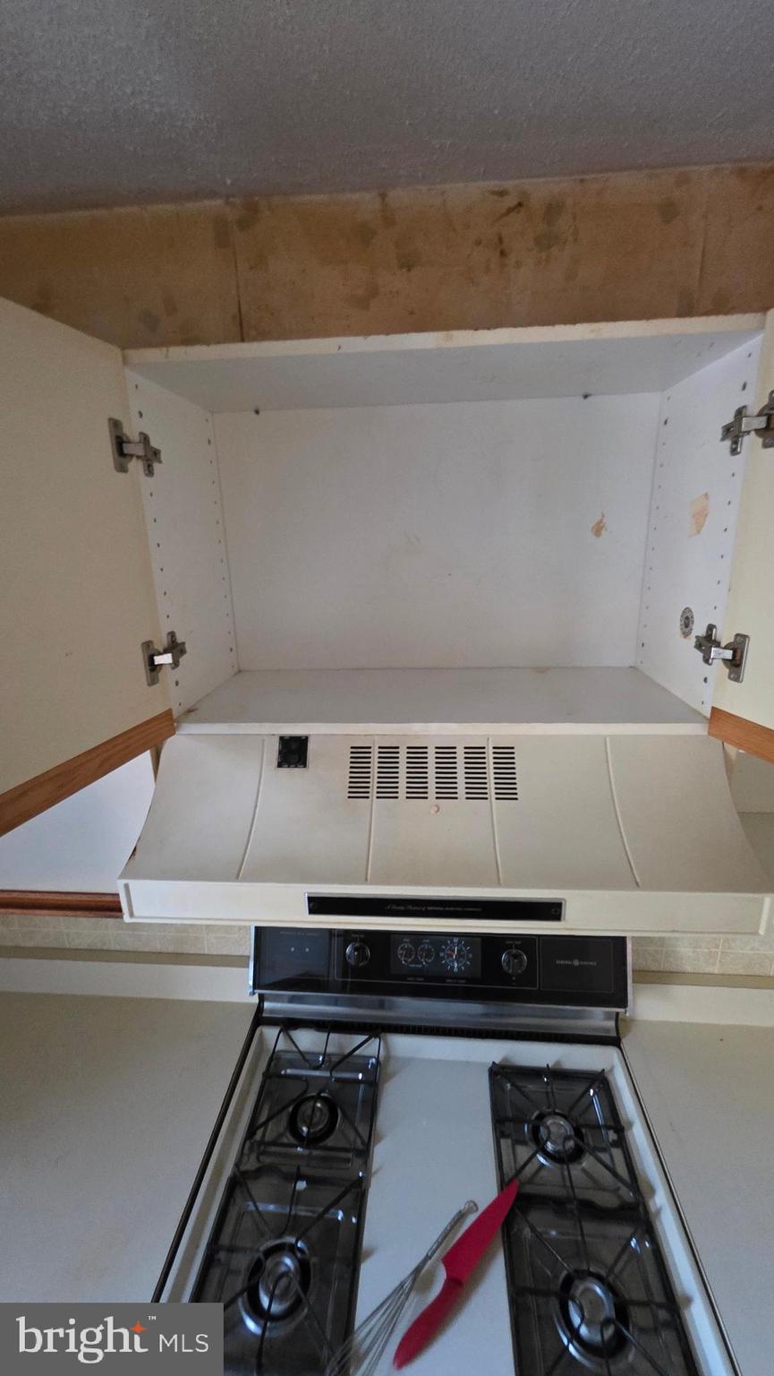 11908 Tarragon Road, Unit G Reisterstown, MD 21136 - Photo 32 of 45 a close up of a car parked in a room