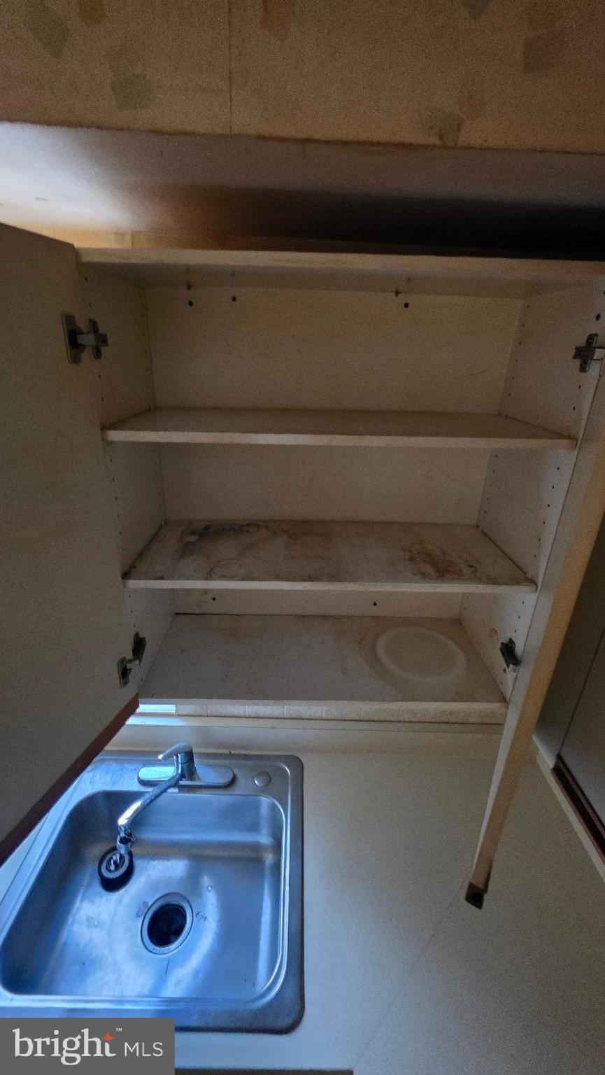 11908 Tarragon Road, Unit G Reisterstown, MD 21136 - Photo 34 of 45 a bathroom with a sink