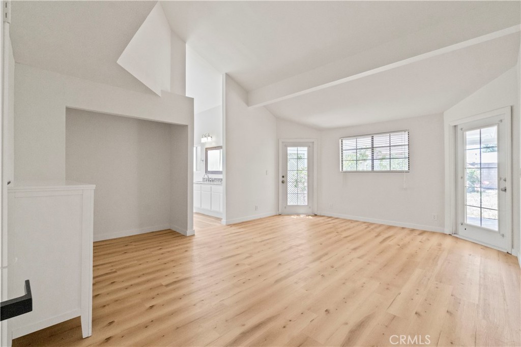 3367 Lathrop Avenue Simi Valley, CA 93063 - Photo 14 of 36 an empty room with wooden floor and windows