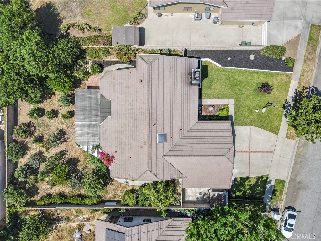 3367 Lathrop Avenue Simi Valley, CA 93063 - Photo 2 of 36 an aerial view of a house with a garden and plants