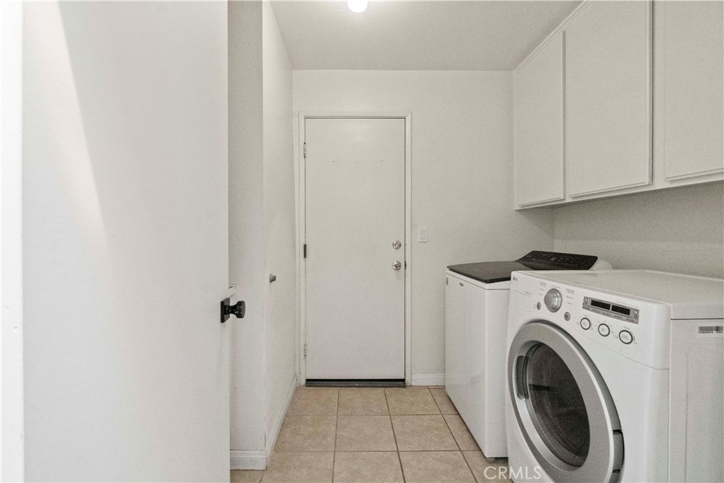 3367 Lathrop Avenue Simi Valley, CA 93063 - Photo 23 of 36 a view of a storage & utility room with washer and dryer