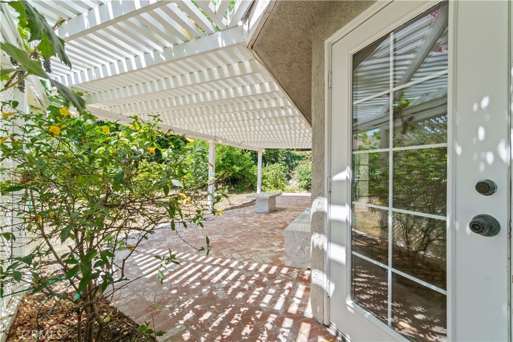 3367 Lathrop Avenue Simi Valley, CA 93063 - Photo 33 of 36 a view of a room with a large window and wooden fence