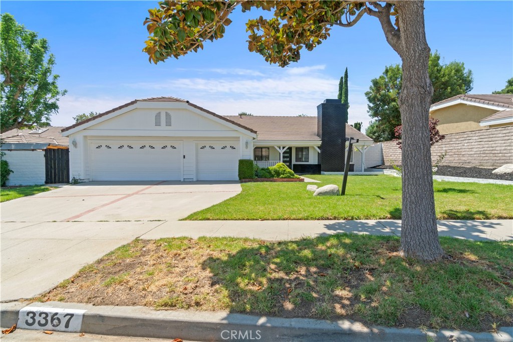 3367 Lathrop Avenue Simi Valley, CA 93063 - Photo 34 of 36 a view of a house with a yard