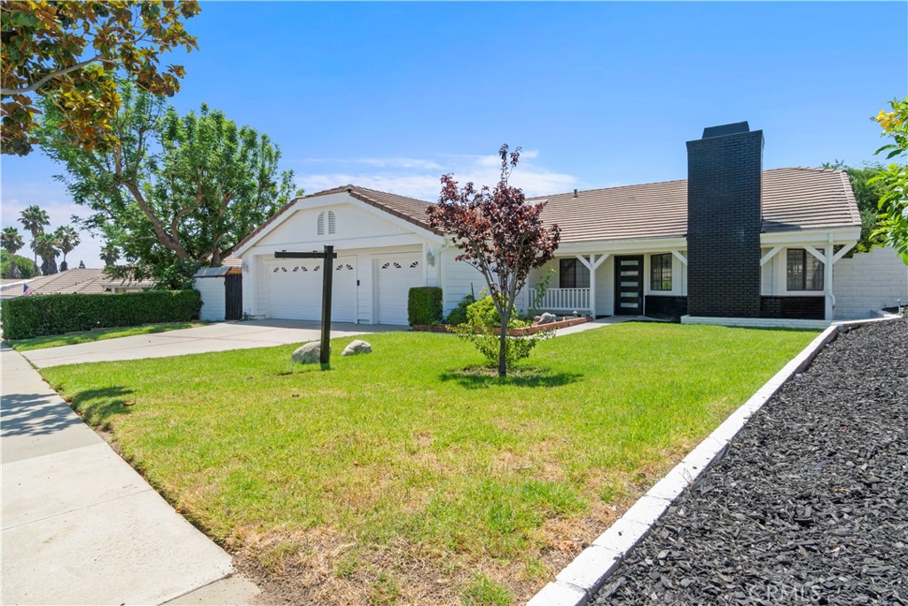 3367 Lathrop Avenue Simi Valley, CA 93063 - Photo 35 of 36 a front view of a house with garden